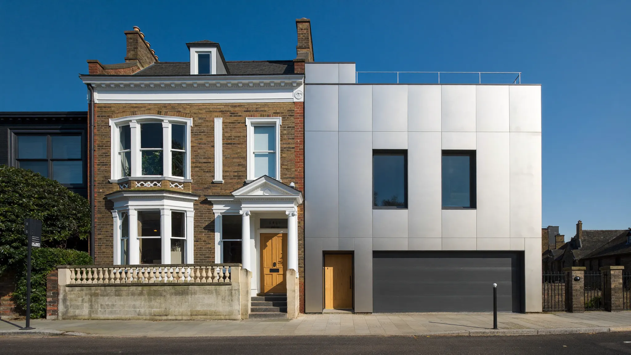 A modern new-build home on the left and a period terraced house on the right, illustrating the choice between them.