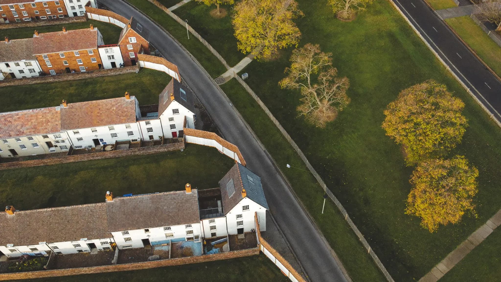 A diagram-style row of terraced houses connected by a line, illustrating a linked property chain.